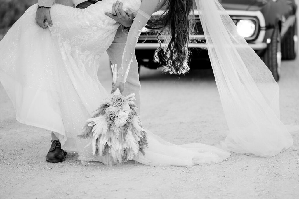 black and white wedding photo of bride and groom in Texas