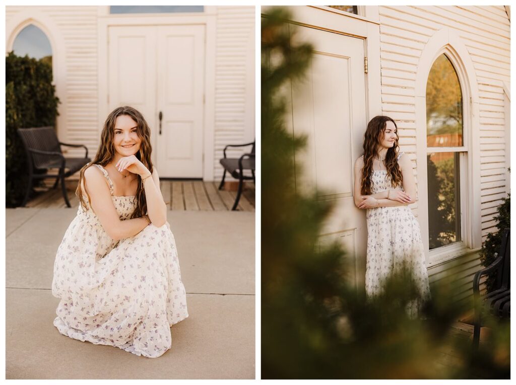 senior girl in white floral dress kneeling posing for camera on left and leaning on door looking in distance for senior lubbock photographer Mary Wiebe Photography
