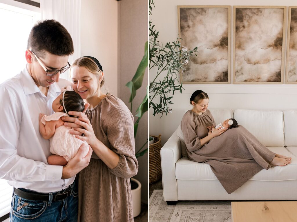 first time parents holding their daughter in their arms, smiling down at her.