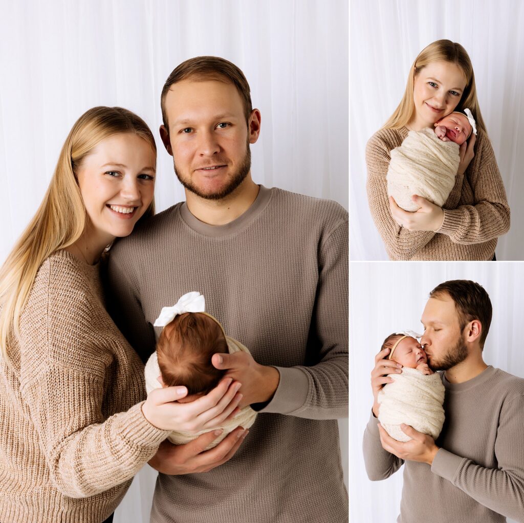 Mom and dad are standing and holding their newborn while Lubbock Newborn Photographer, Mary Wiebe captures this family. 