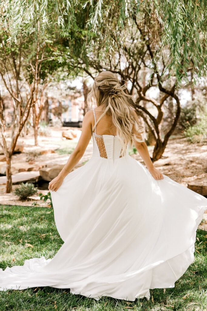 Bride spinning in her dress at a
W
est Texas Wedding Venue