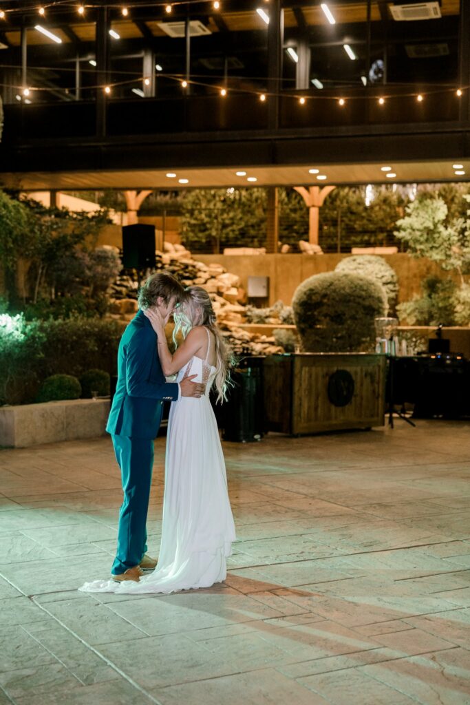 Last dance photo of bride and groom.