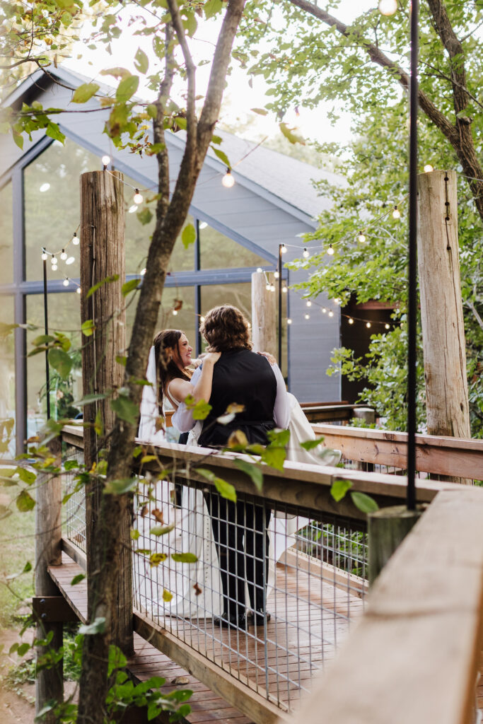 Bride and groom outside of venue reception area at Merrick Hollow.