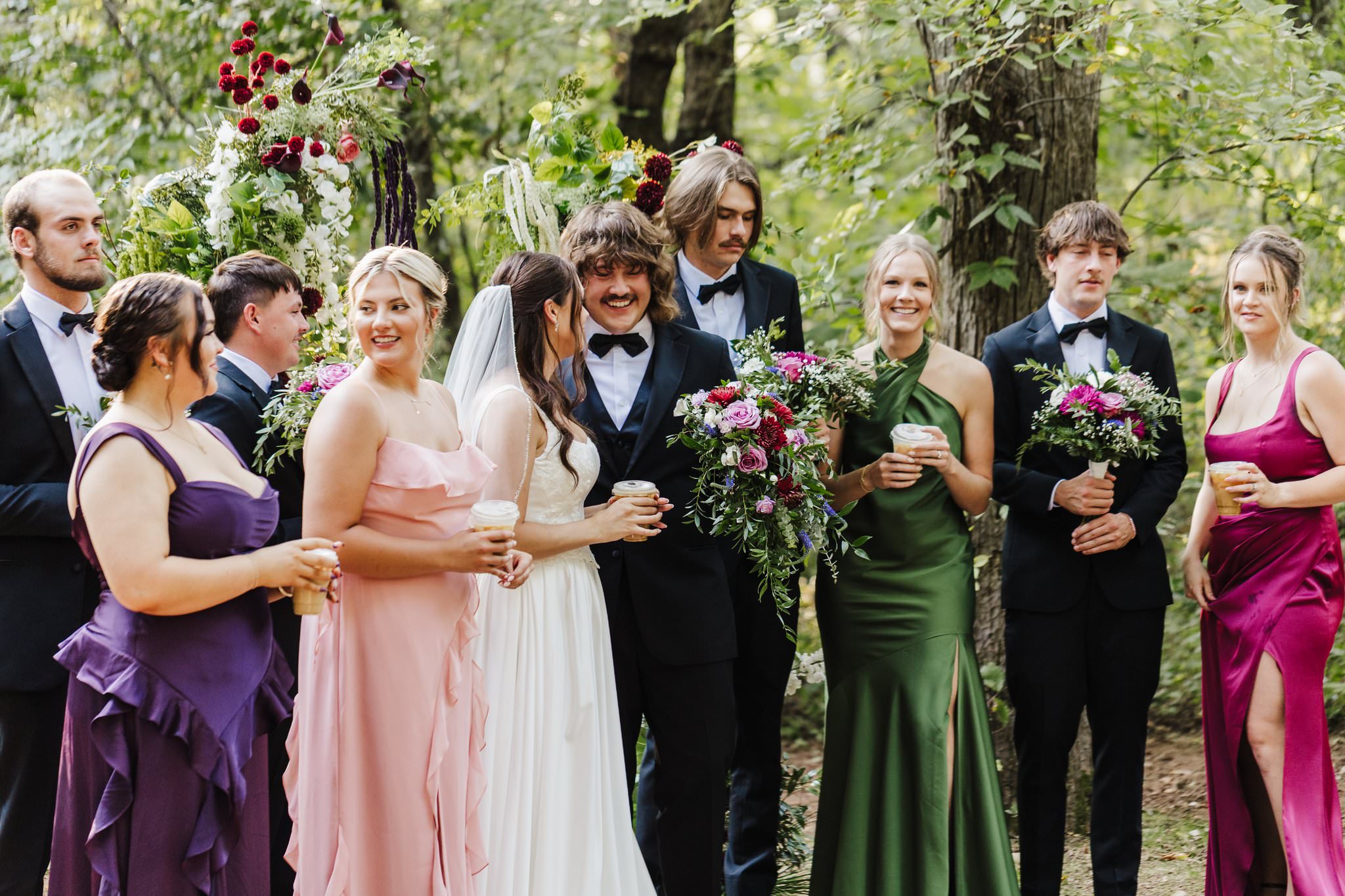 Groom smiling at bride during portraits at Merrick Hollow in Oklahoma.