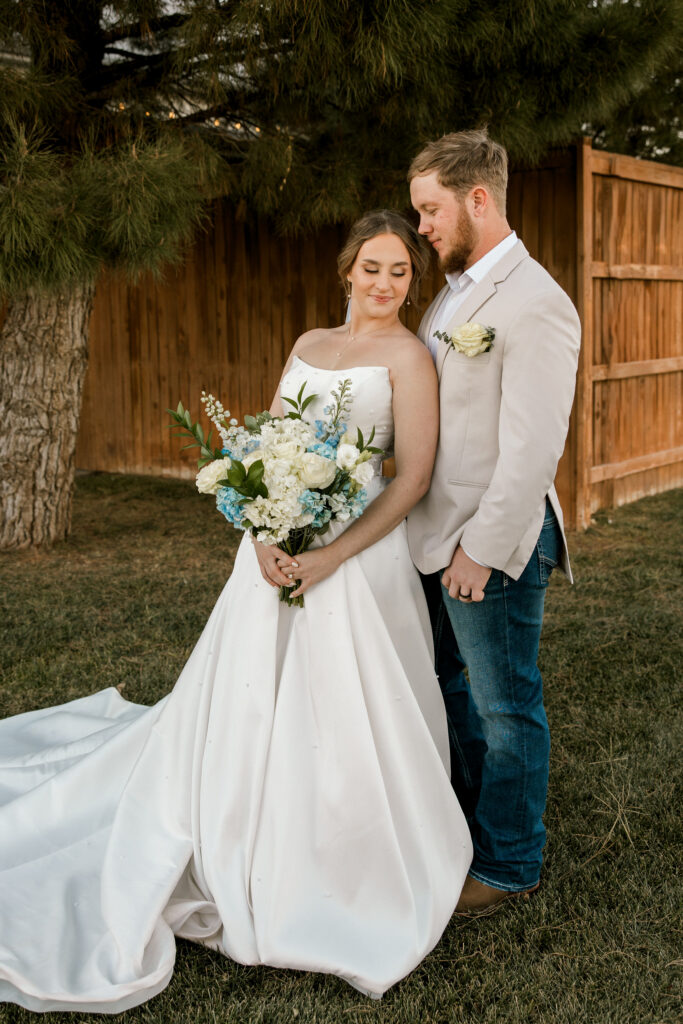 Bride and groom portraits at Autumn Oaks wedding venue.