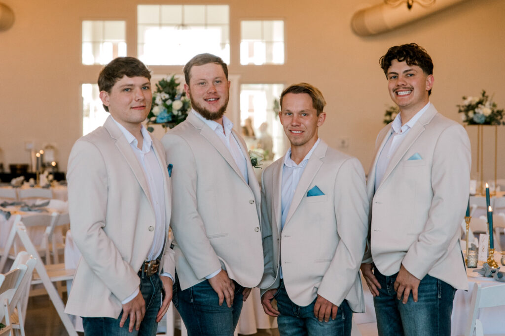 groom and his groomsmen in the reception area of the venue.