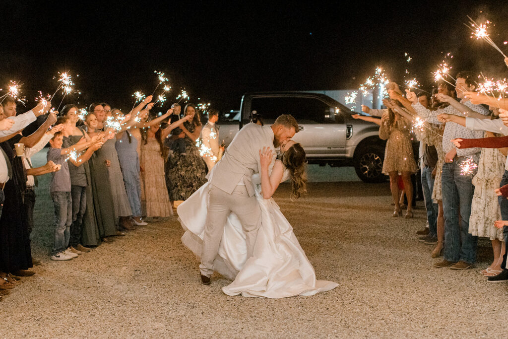 different angle of the dip kiss during sparkler exit.