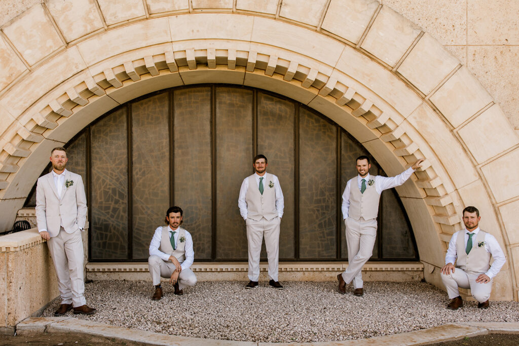 Groom and groomsmen at the MS Doss chapel, posing for a portrait.