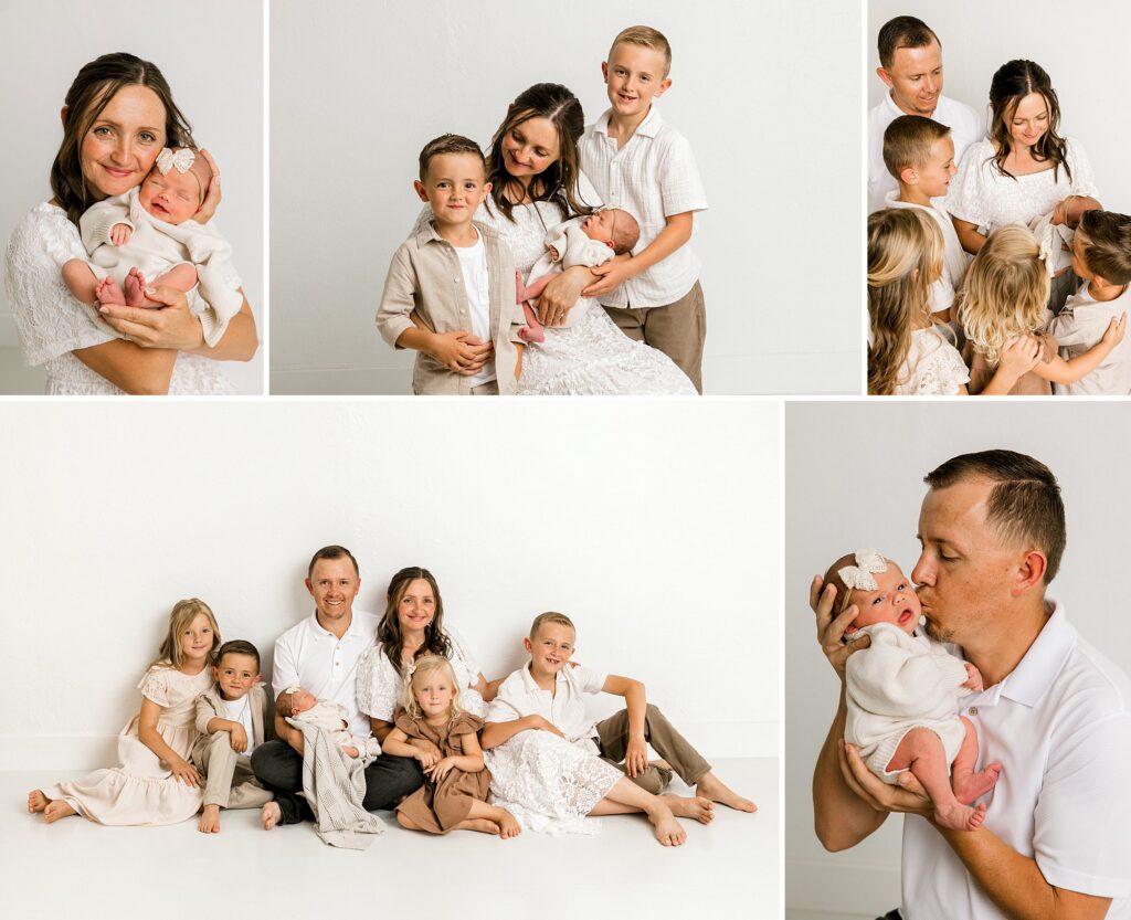 Mom holding newborn girl for their newborn photography session.