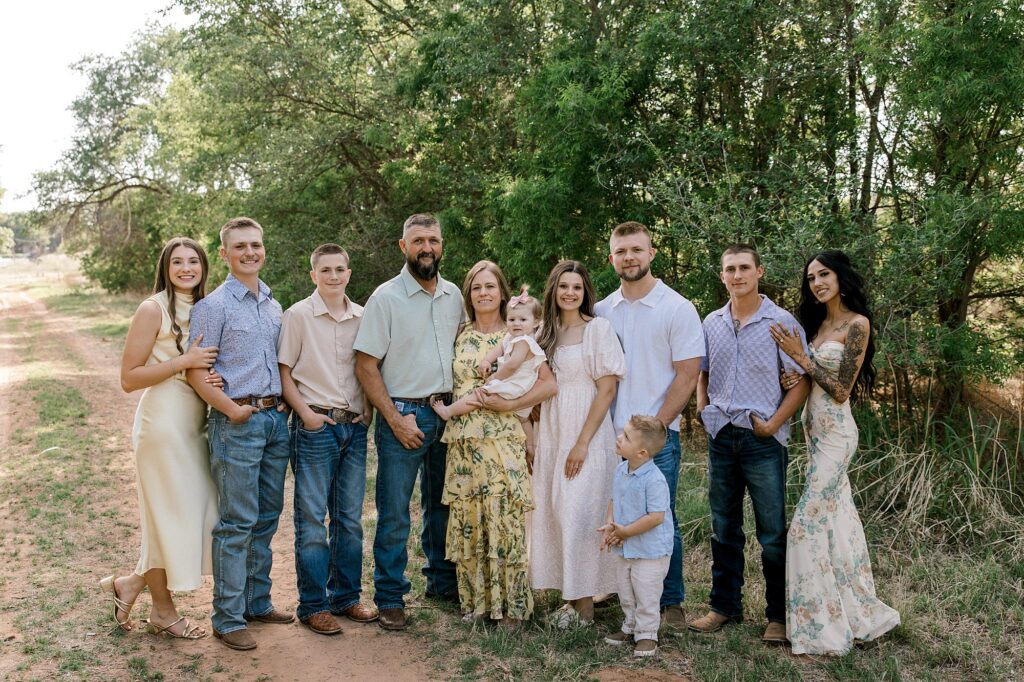 Extended family huddled together for photo.