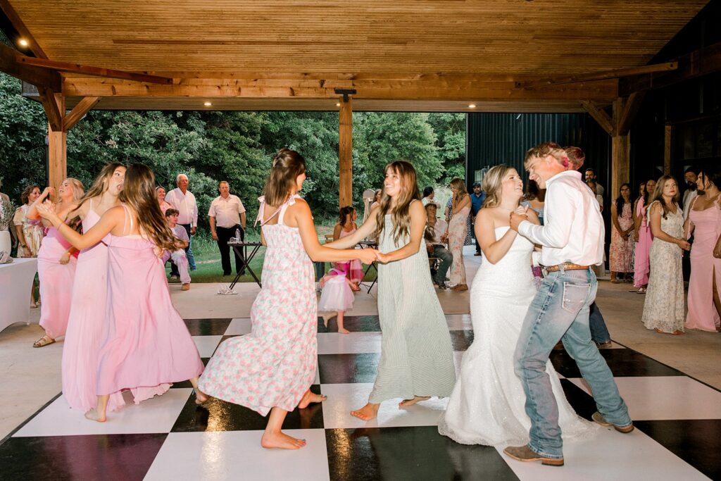 Bride and groom slow dancing. Captured by Mary Wiebe Photography.